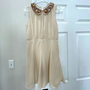 Pinky embellished cream dress